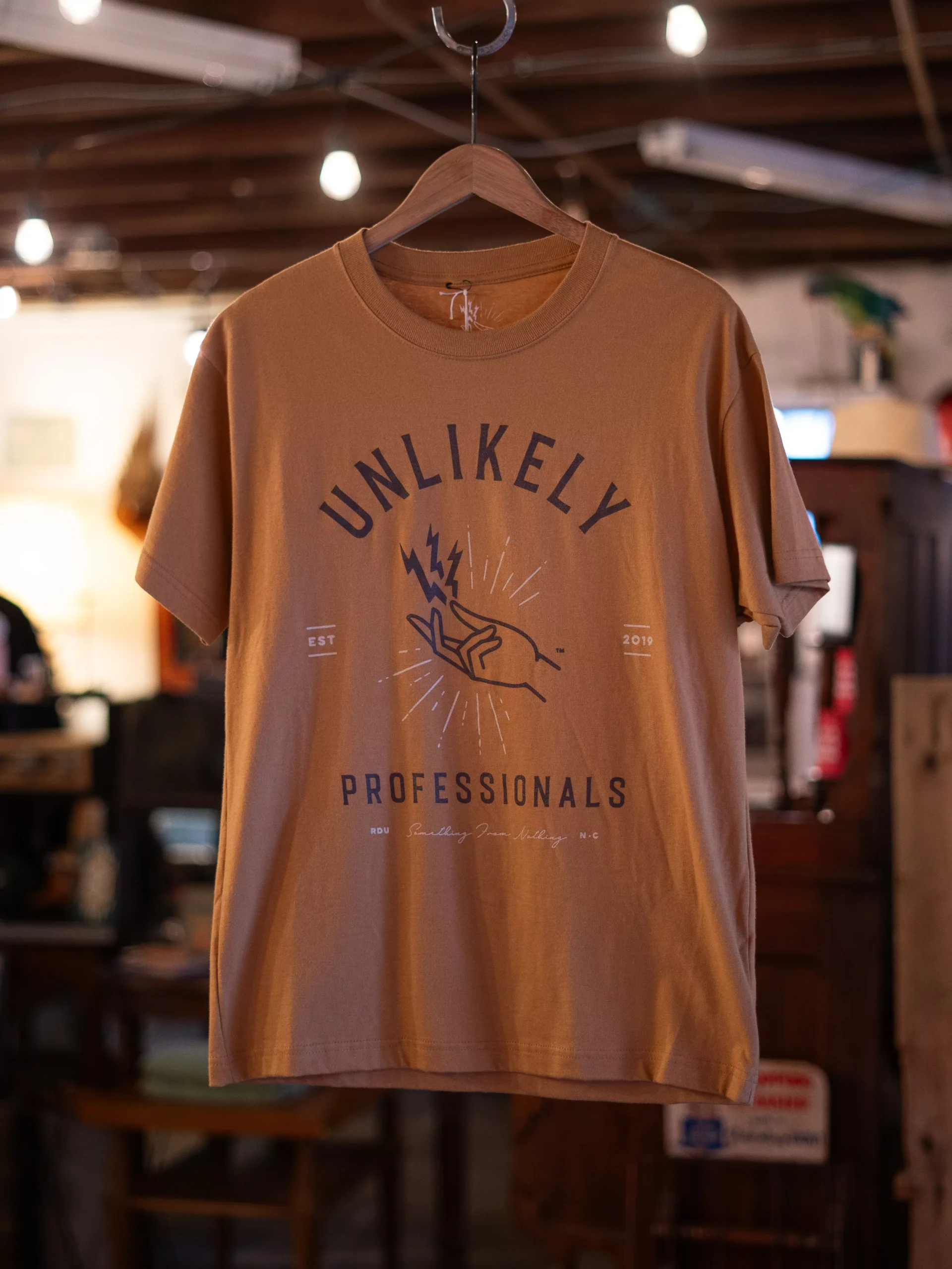 Unlikely Professionals Logo Tee: Yellow